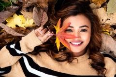 Sarah in leaves